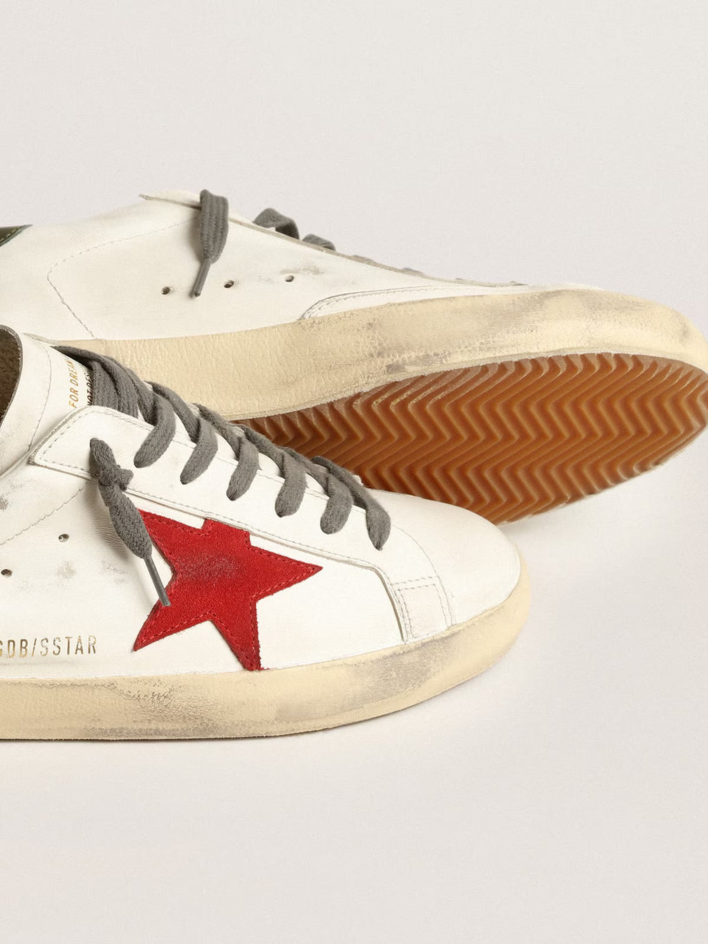 Super-Star Uomo con stella in suede rosso e talloncino in pelle verde "ULTIMI PEZZI"