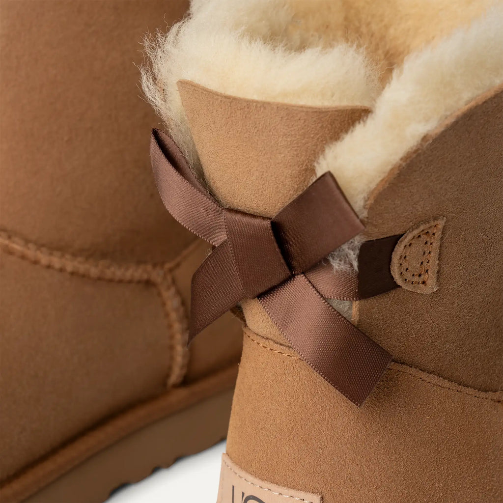 UGG Women's Mini Bailey Bow II Boots in Chestnut