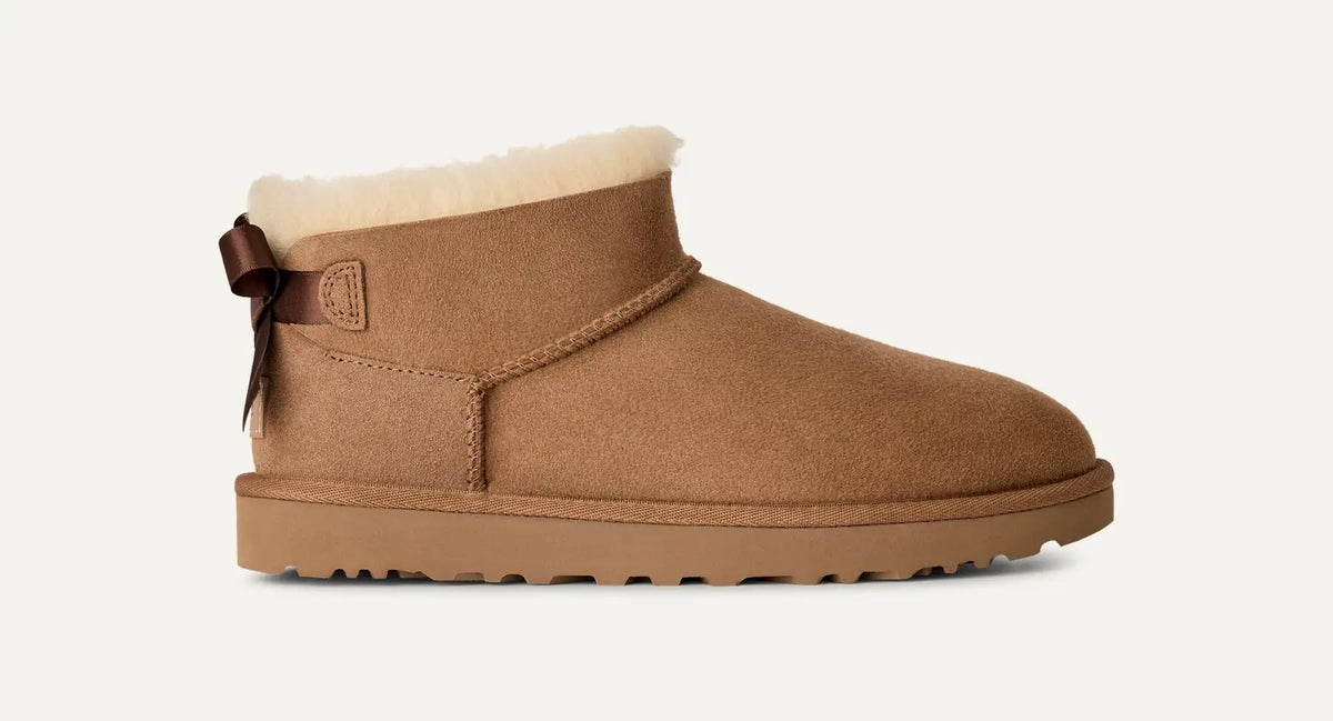 UGG Women's Ultra Mini Bailey Bow Boots in Chestnut