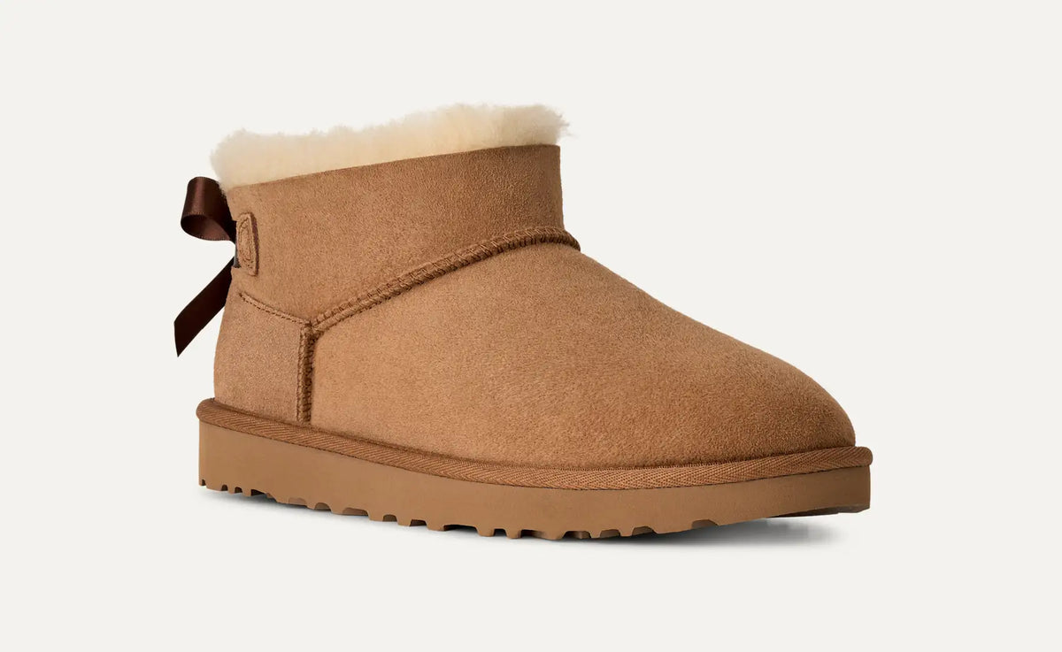 UGG Women's Ultra Mini Bailey Bow Boots in Chestnut