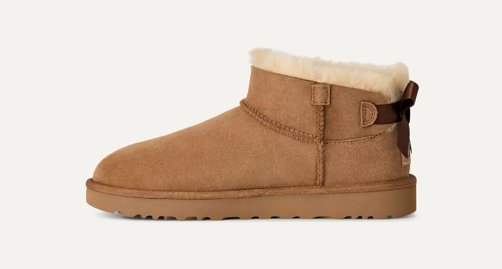 UGG Women's Ultra Mini Bailey Bow Boots in Chestnut