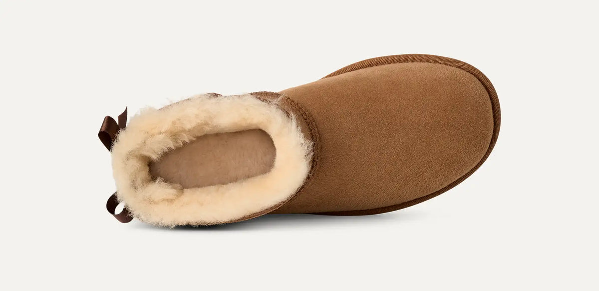 UGG Women's Ultra Mini Bailey Bow Boots in Chestnut