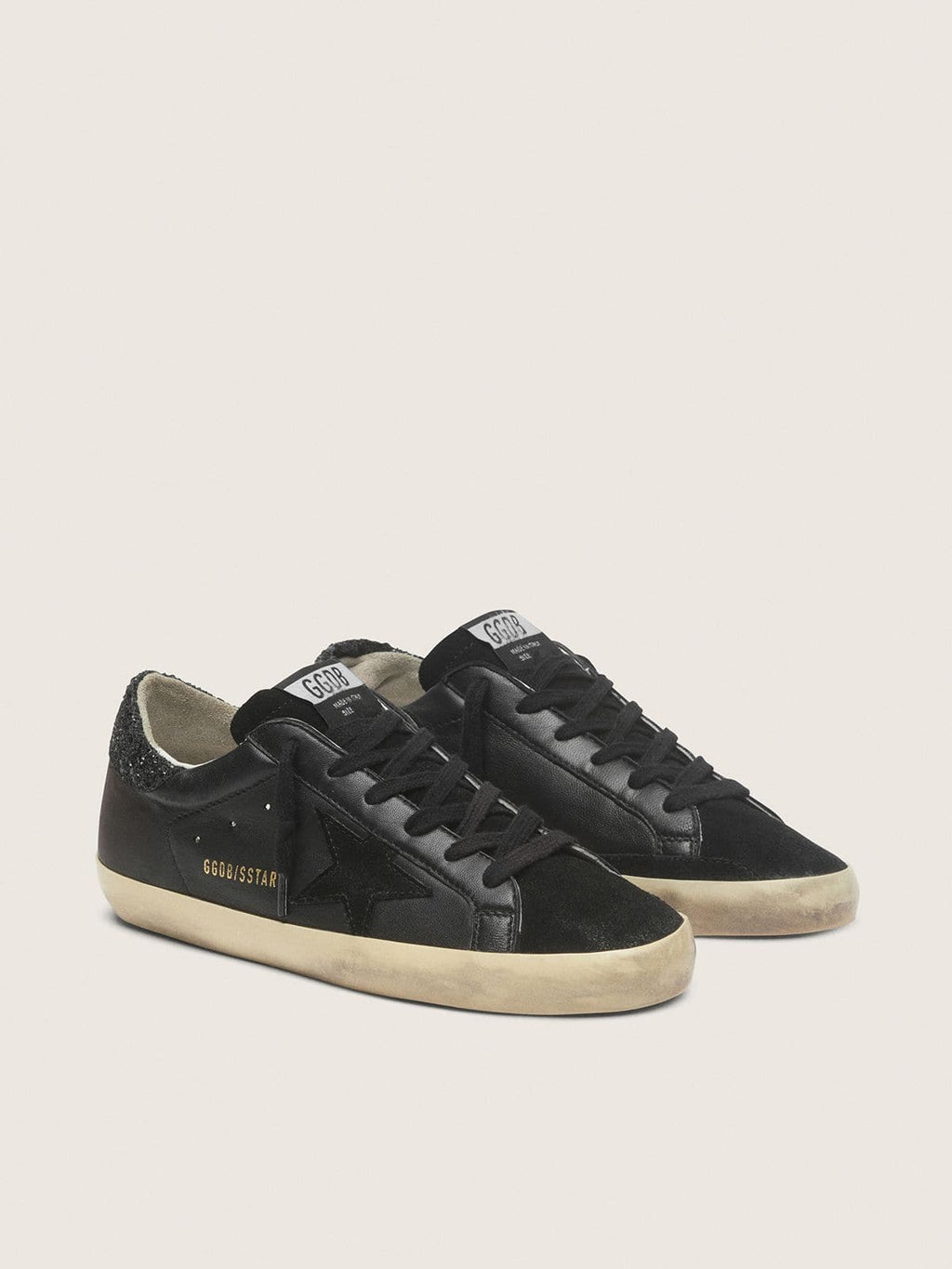Golden Goose Super-Star Donna in Nappa Nera con Stella in Suede Nero e Talloncino in Glitter Neri