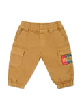 Pantaloni per neonato Moschino Kids marroni con applicazione logo – Accessorio premium elegante