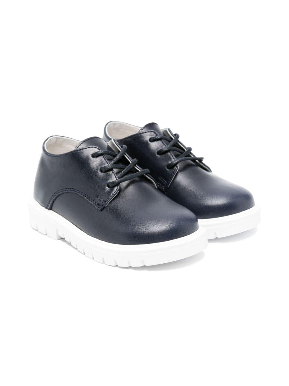 Sneakers in pelle